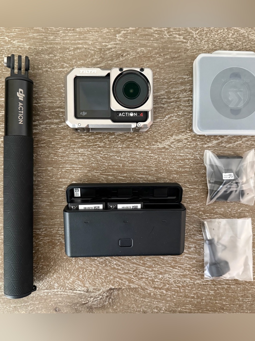 DJI Action 4 Silver Action Camera Kit with Black Grip and Charging Case